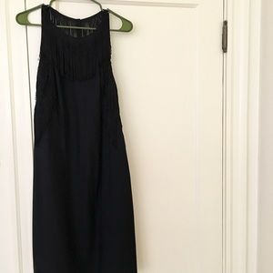 Black backless dress with fringe